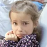 scared little girl in dental chair