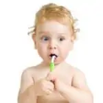 baby brushing teeth