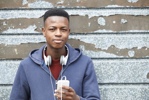 teen with headphones