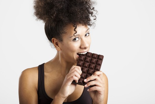woman eating chocolate