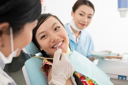 young lady in dental chair