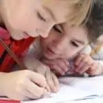 young children doing homework